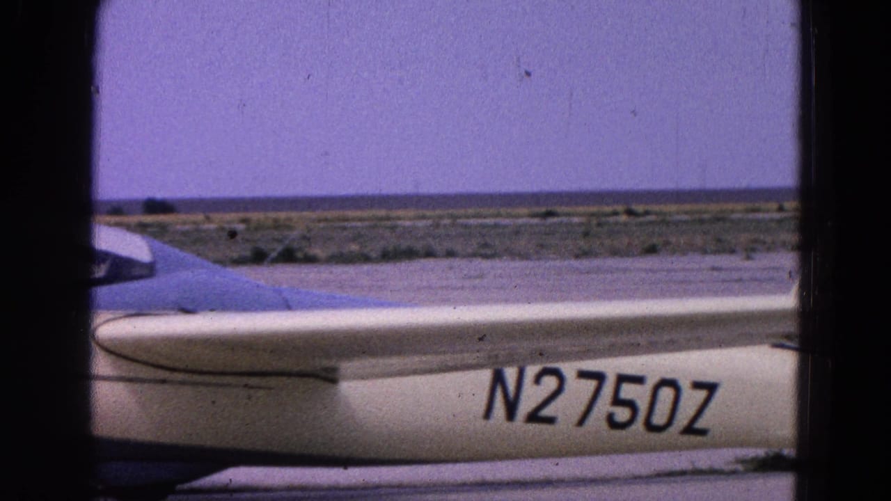 White glider on tarmac with registration N2750Z visible along the fuselage.