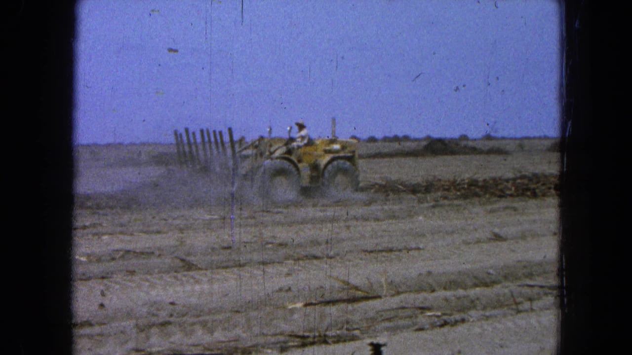 In the 1965 Pueblo, Mexico clip, a driver operates a yellow tractor as dust rises from the dry field.
