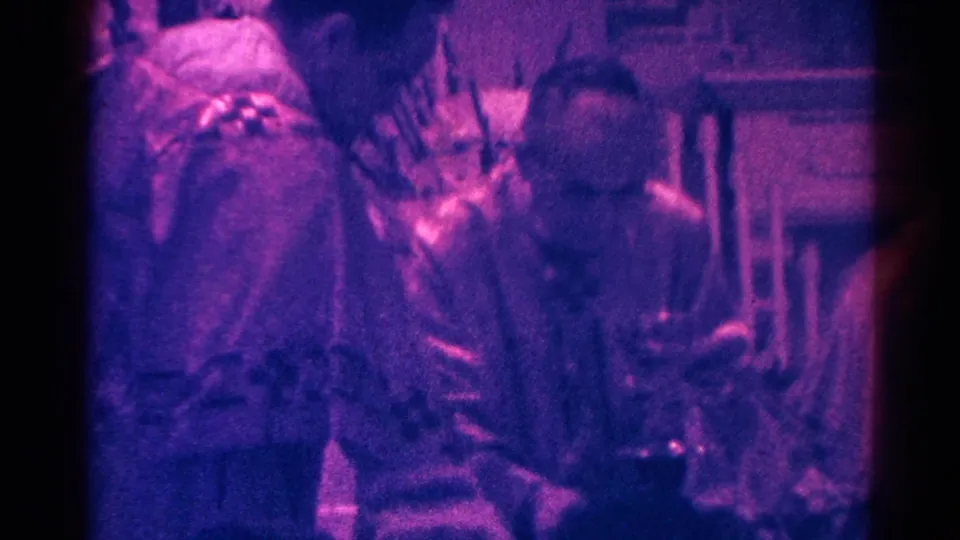 Handheld 8mm view of Catholic clergy and church furnishings during a 1966 Danville Mass.