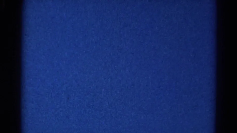 1966 Danville baseball clip frame appears as blue dusk 8mm texture with dark gate-edge bars and no readable players visible.