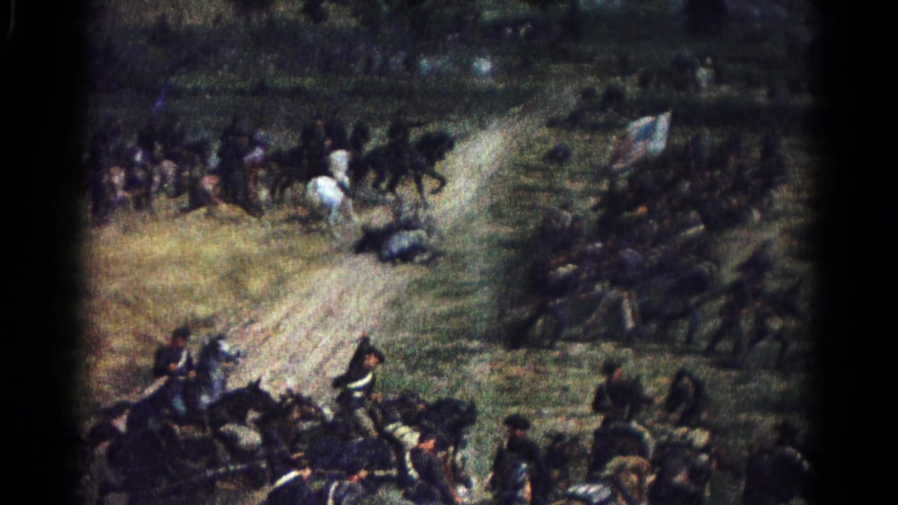 Painted Civil War battle scene with cavalry, infantry, fallen figures, and a flag on a grassy field.