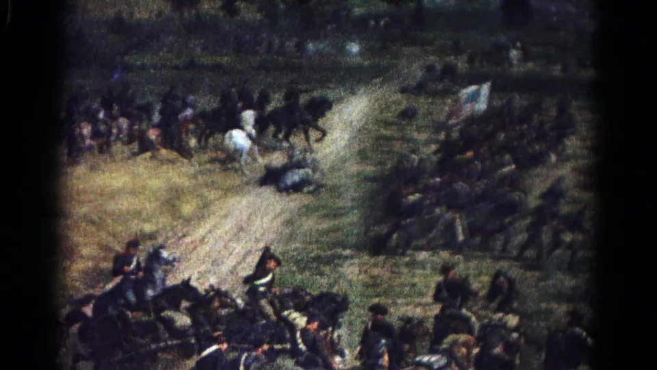 1966 8mm frame from Hagerstown showing a filmed painting of Civil War soldiers, horses, and infantry clustered across a battlefield.