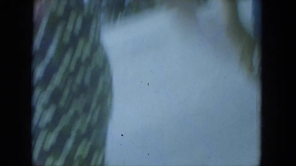 The final frame is largely blocked by a nearby person or garment, showing green patterned fabric and bright overexposed space.