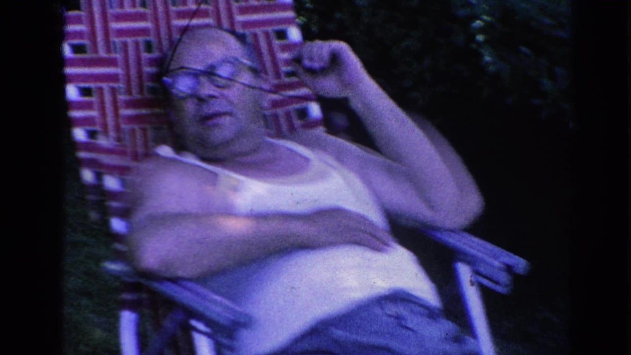 In 1966 Silver Lake home-movie footage, a man in glasses and a white tank top rests in a red-and-white woven lawn chair.