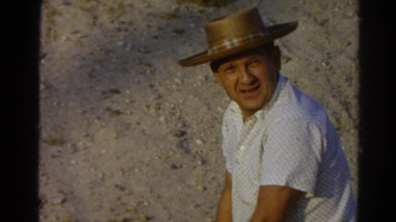 In the final frame, the seated man turns toward the camera and smiles in the 1966 Silver Lake home-movie shot.