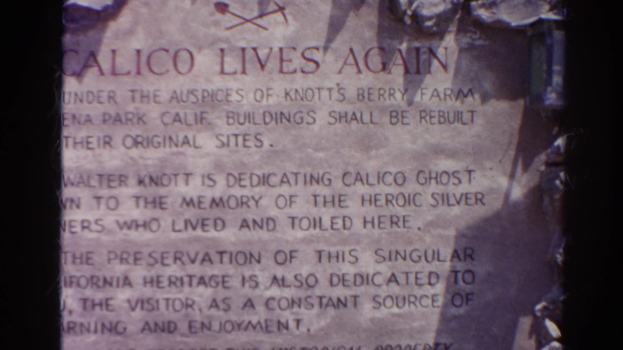 Close-up of a weathered stone inscription headed Calico Lives Again.