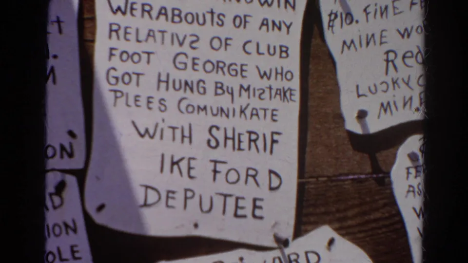 Close 8mm view of a handwritten Silver Lake bulletin-board notice mentioning Club Foot George, Sheriff Ike Ford, and a request to communicate.