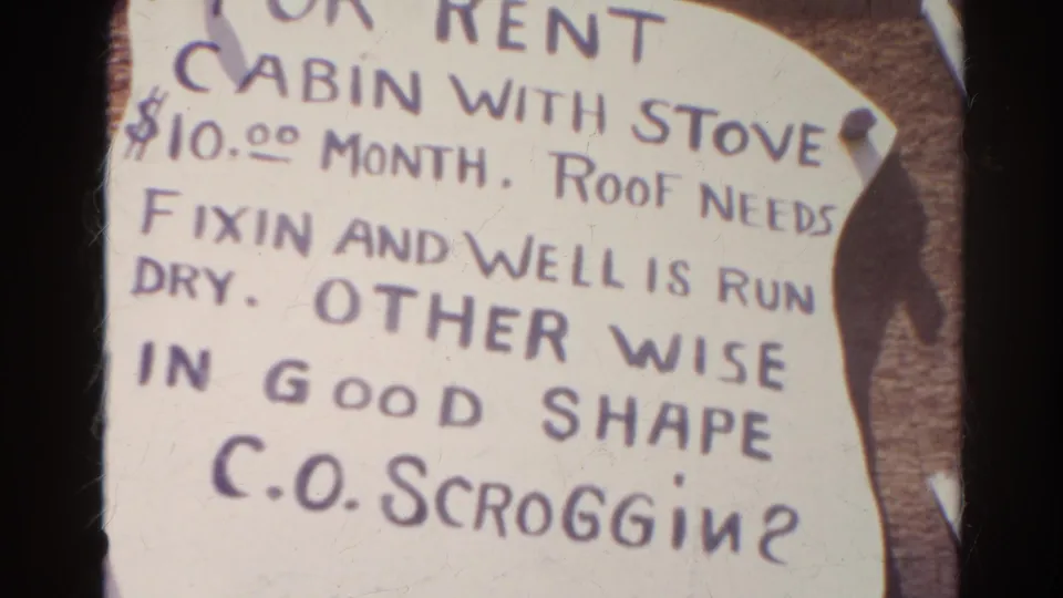 Repeated 8mm contact-sheet frame of the Silver Lake cabin rental notice, including stove, roof, well, and condition wording.