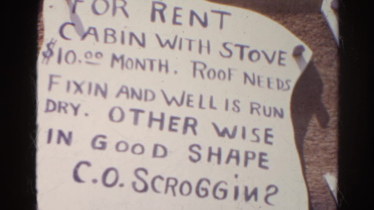 Handwritten cabin rental notice with repair and dry well notes.