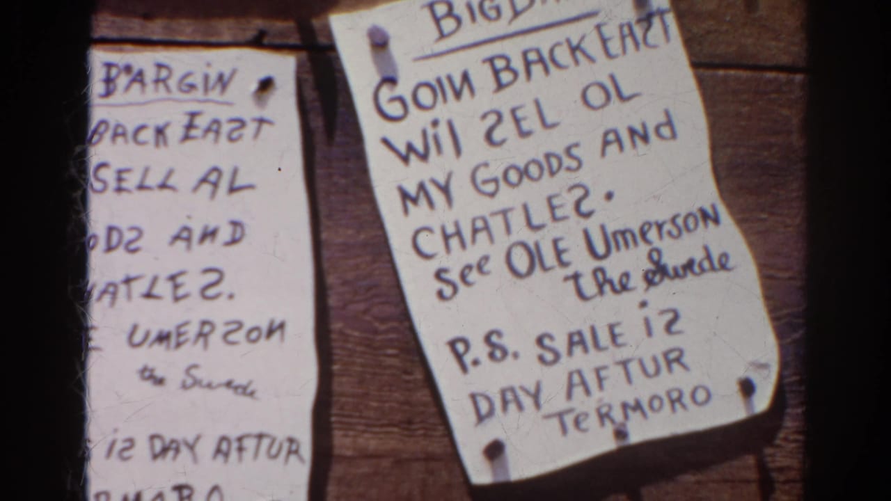 1966 Silver Lake 8mm frame showing cropped handwritten bargain notices pinned to a wooden board.