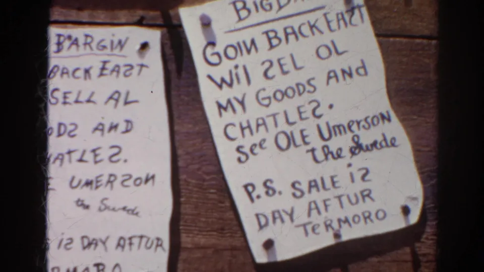 1966 Silver Lake 8mm frame showing cropped handwritten bargain notices pinned to a wooden board.