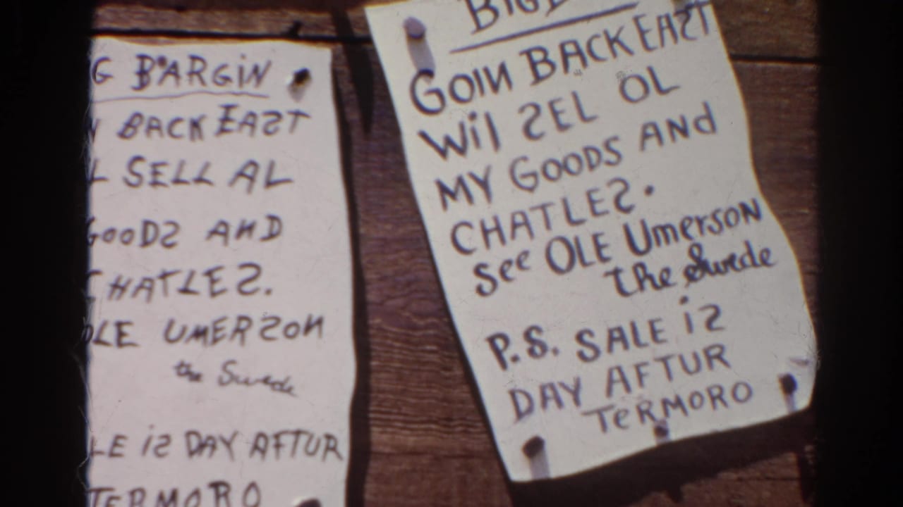 Pinned handwritten notice reading in part Big Bargain and See Ole Umerson.