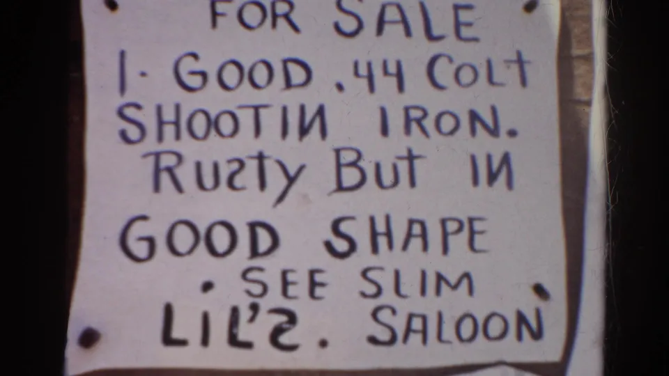 1966 Silver Lake frame showing a handwritten notice for a rusty but usable .44 Colt revolver, with Lil'2 Saloon named below.