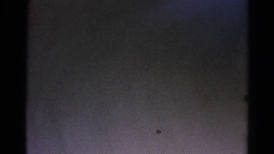 Opening 8mm frame with a dark gate area and a partial 1966 Silver Lake residential view in the upper right.