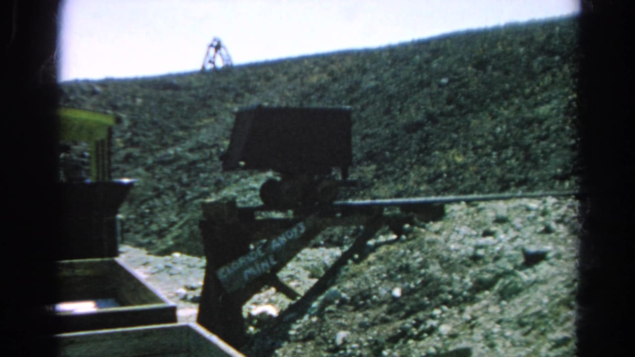 Silver Lake, California 1966 frame showing the tram support and rail line as the green car moves partly out of view.