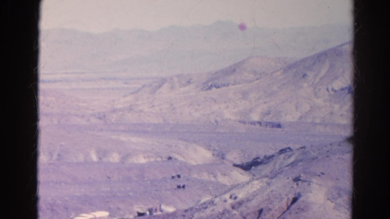 1966 Silver Lake, California home-movie view of arid hills, valley terrain, and hazy mountains with visible film wear.
