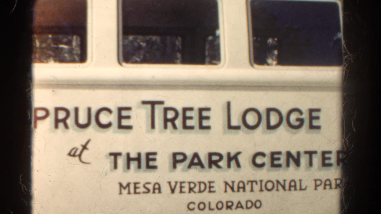 Close view of a Pruce Tree Lodge sign with Park Center and Mesa Verde text partially visible.