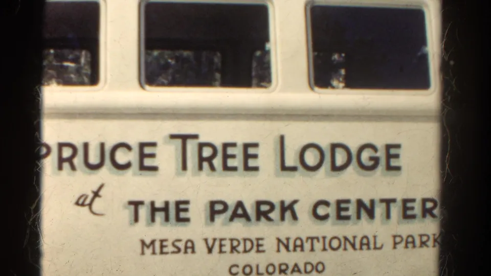 Close 1967 home-movie view of Pruce Tree Lodge at The Park Center signage in Mesa Verde National Park, Colorado.