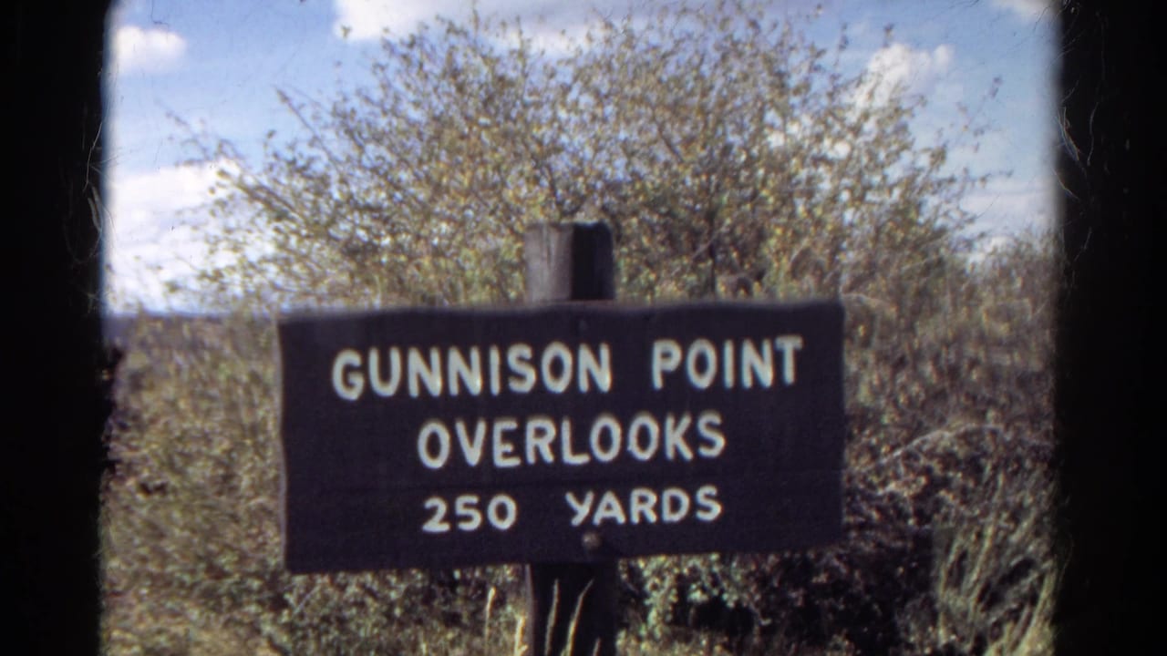 Gunnison Point Overlooks sign repeated in a nearby handheld frame.
