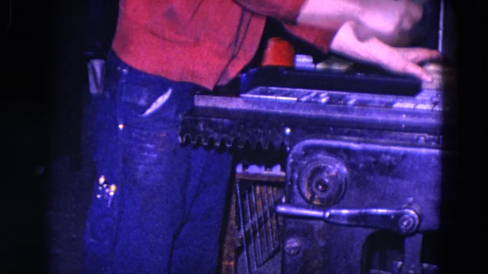 The final 1967 Trenton frame shows the worker leaning over heavy forge equipment with the hammer raised near the work surface.