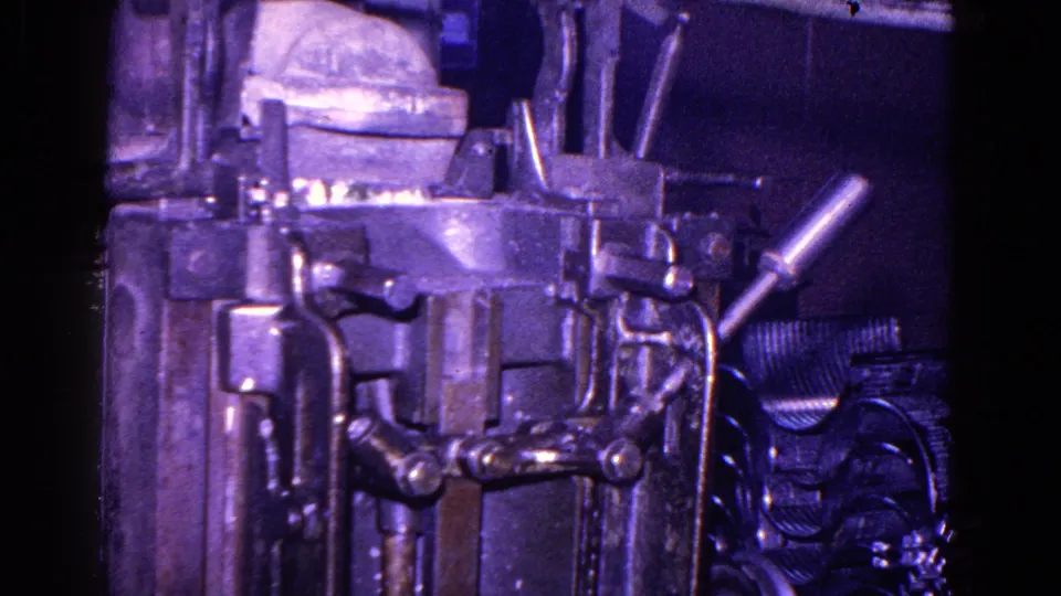 The 1967 factory footage shows a heavy machine front with exposed pipes, handles, and linked metal parts.
