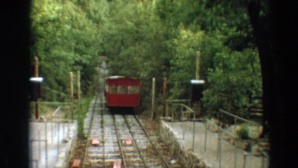 A closer 1968 Branson view shows the red incline rail car on the track, bordered by trees, walls, and simple railings.