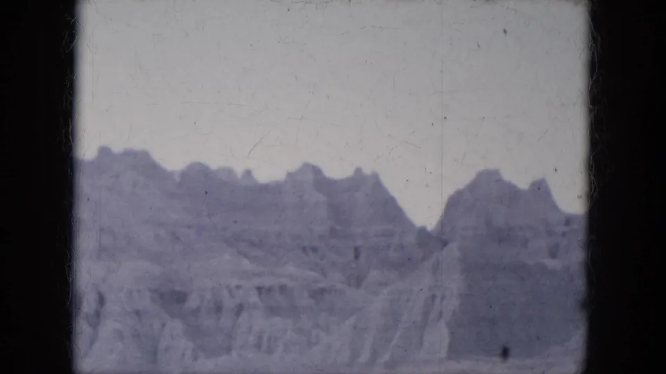Rocky Lake Canyon, Arizona formations seen in a 1969 8mm home movie, with visible scratches and soft exposure.