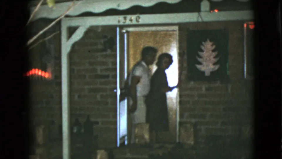 In 1968 home-movie footage from Clarksdale, Arizona, two adults appear in the doorway of a brick house marked 1340 at night.