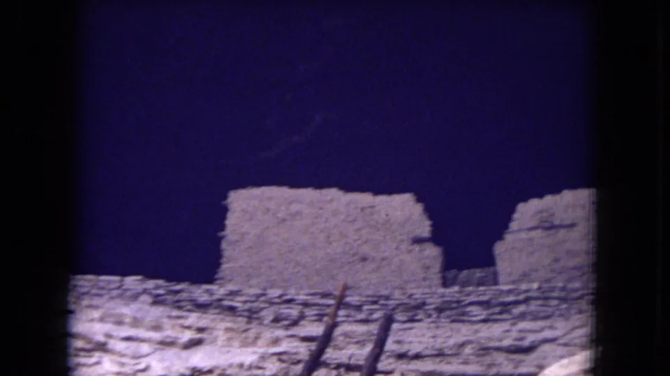 1973 Gila National Forest 8mm view of a block-like pueblo-style ruin section and rough stone wall line.