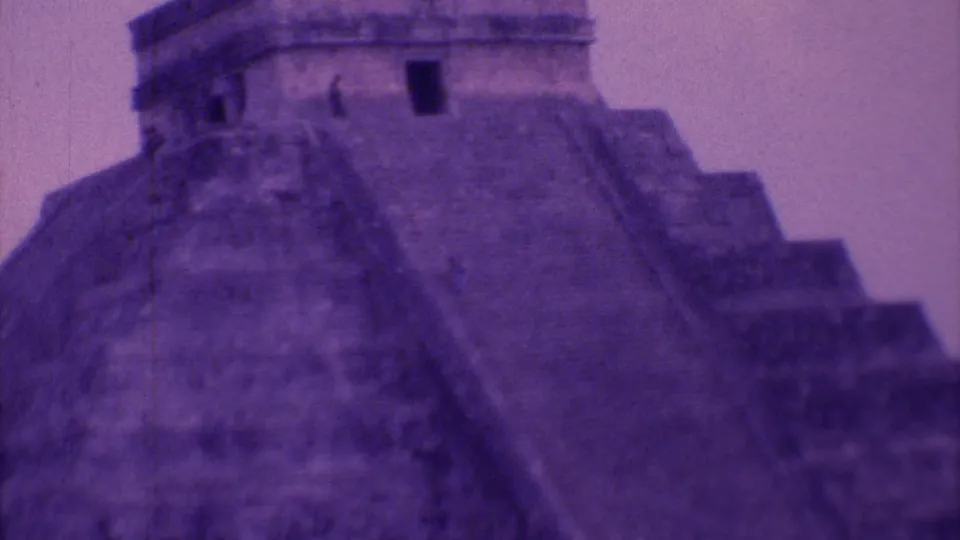 1973 Mexico City footage shows the upper portion of a pyramid-like landmark with steep steps and a small top structure.