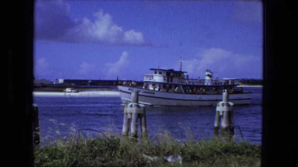 The Miss Cape Canaveral appears closer on the water, with passengers on deck and Fort Wayne metadata-supported location context.