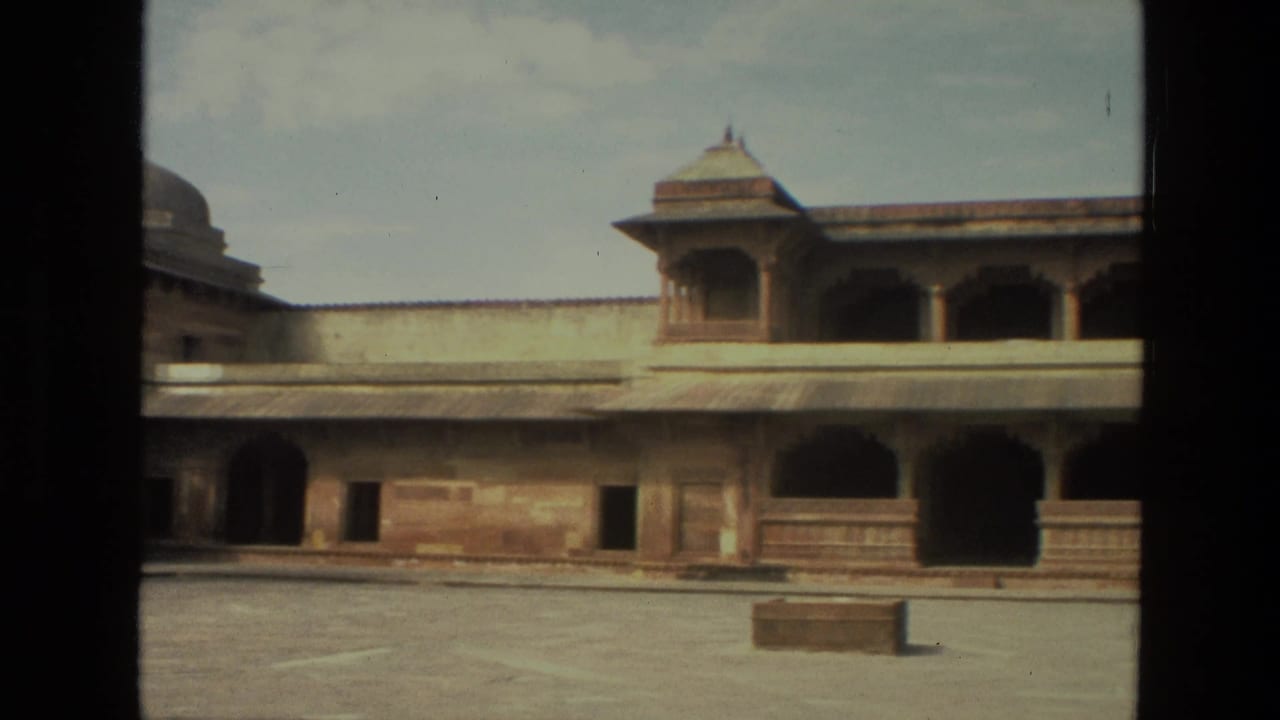 Courtyard facade with arched colonnade and domed pavilion roof.