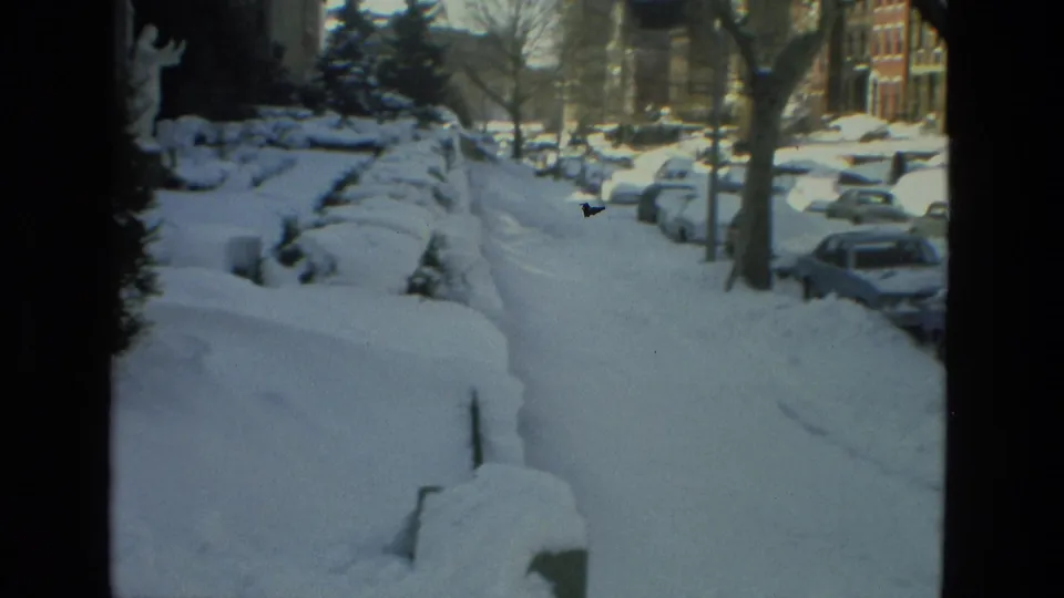 A 1978 Drexel Hill street scene shows heavy snow over parked cars, sidewalks, shrubs, and residential buildings.