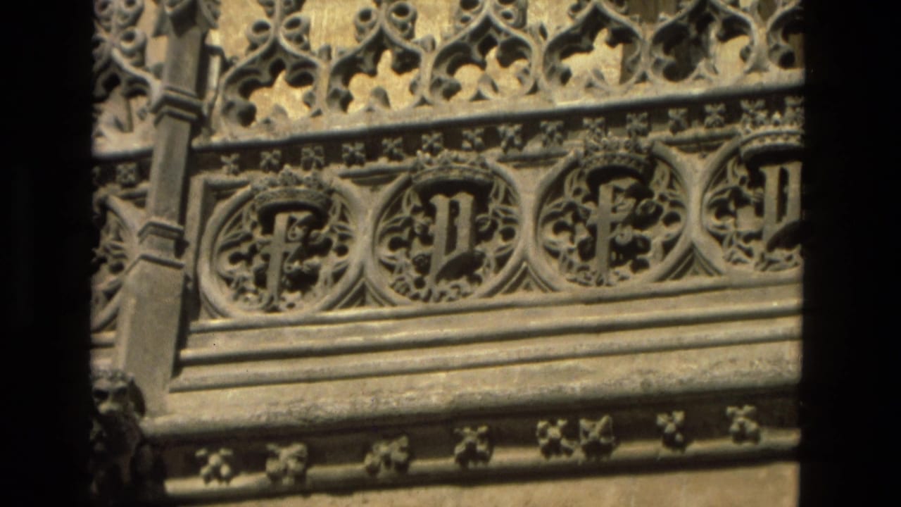 1978 8mm view in Córdoba, Spain, showing carved stone medallions and delicate tracery on a historic facade.