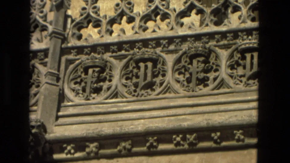 1978 8mm view in Córdoba, Spain, showing carved stone medallions and delicate tracery on a historic facade.
