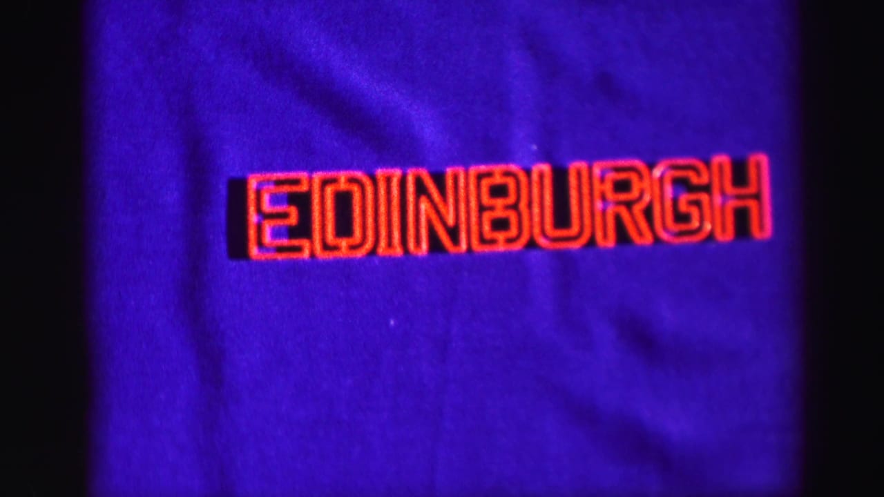 Blue title card with red lettering reading Edinburgh.