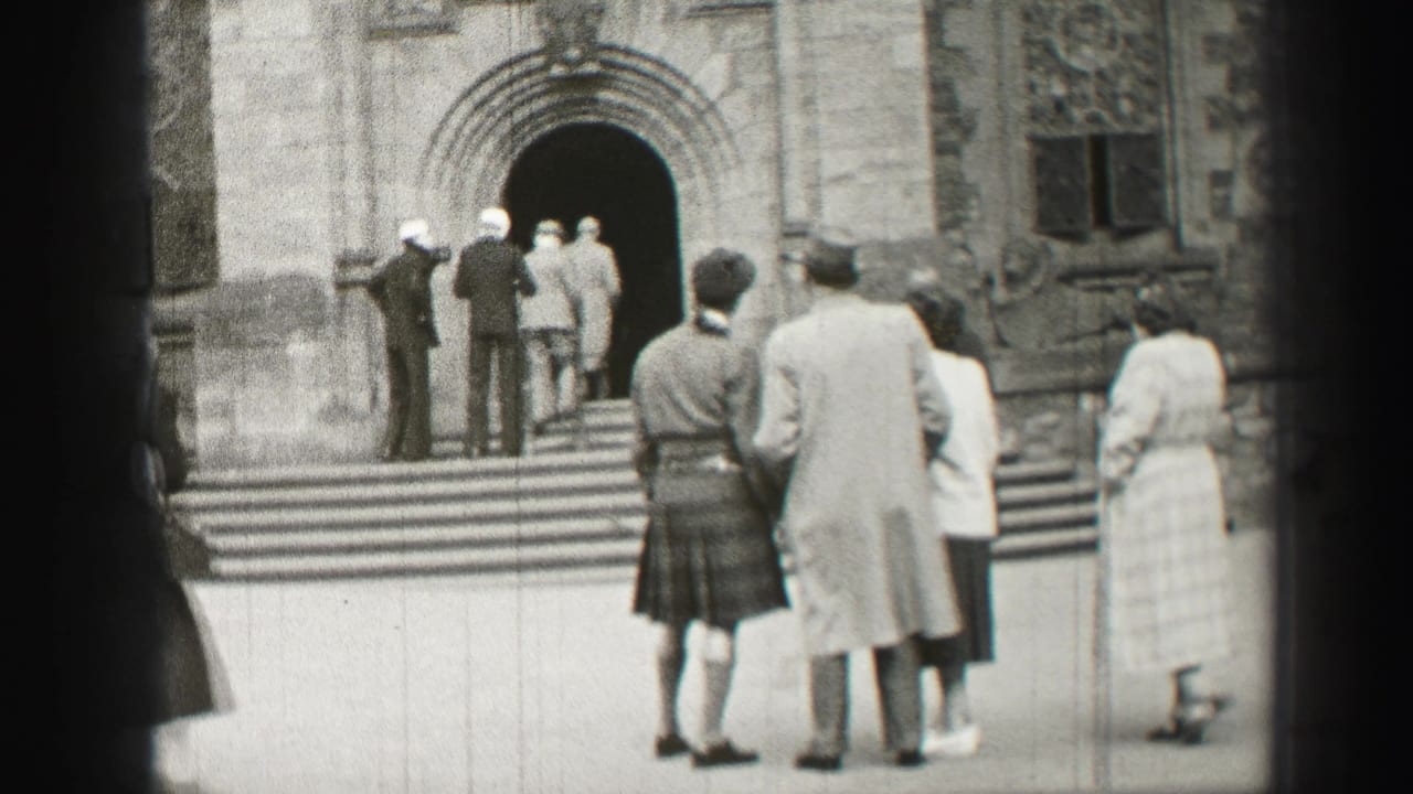 1952 Edinburgh church exterior with kilted men, visitors in coats, and people entering an arched doorway.