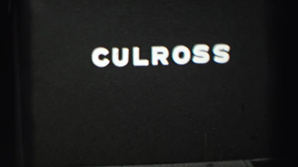A plain home-movie title card reads CULROSS in large white block letters against a dark background.
