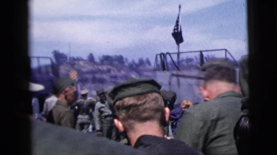 1958 New York City port scene with uniformed soldiers clustered near a ship railing, flag, smoke, and distant shoreline.