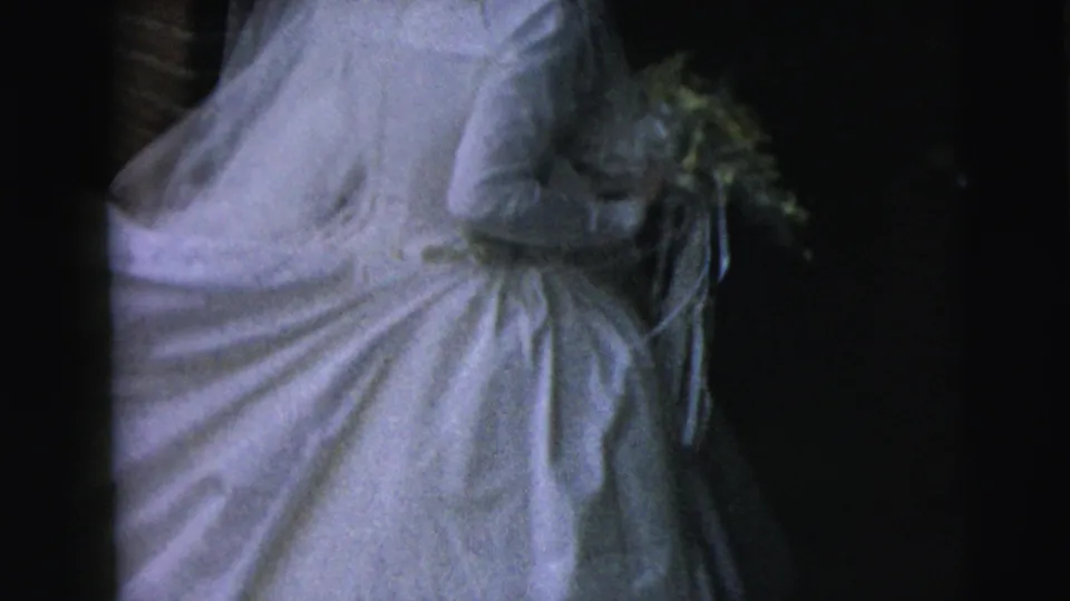 In the final frame, the bride moves forward in a voluminous white gown and veil, carrying her bouquet beside the dark limousine.