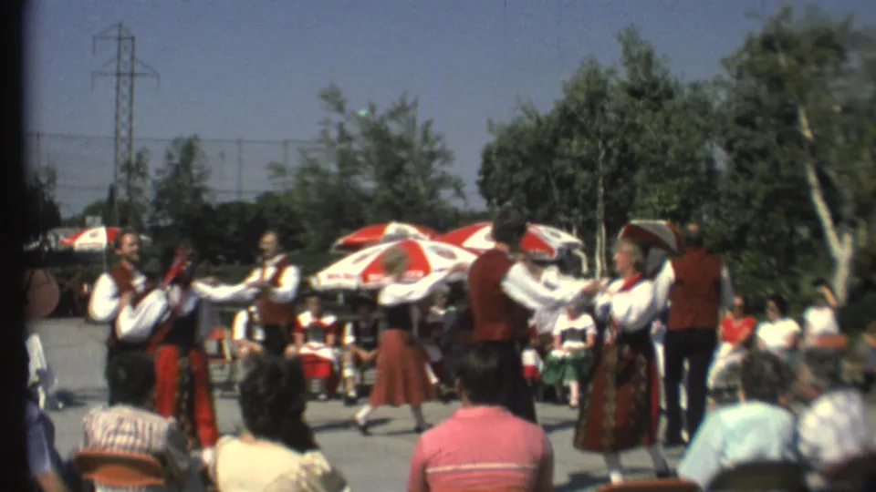 Norwegian folk dancers in red vests and patterned skirts perform outdoors at Grand Canyon in 1972.