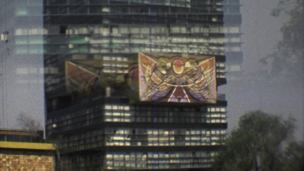 A soft 8mm view centers the abstract banner on a modern Mexico City tower, with trees and a lower building roofline below.