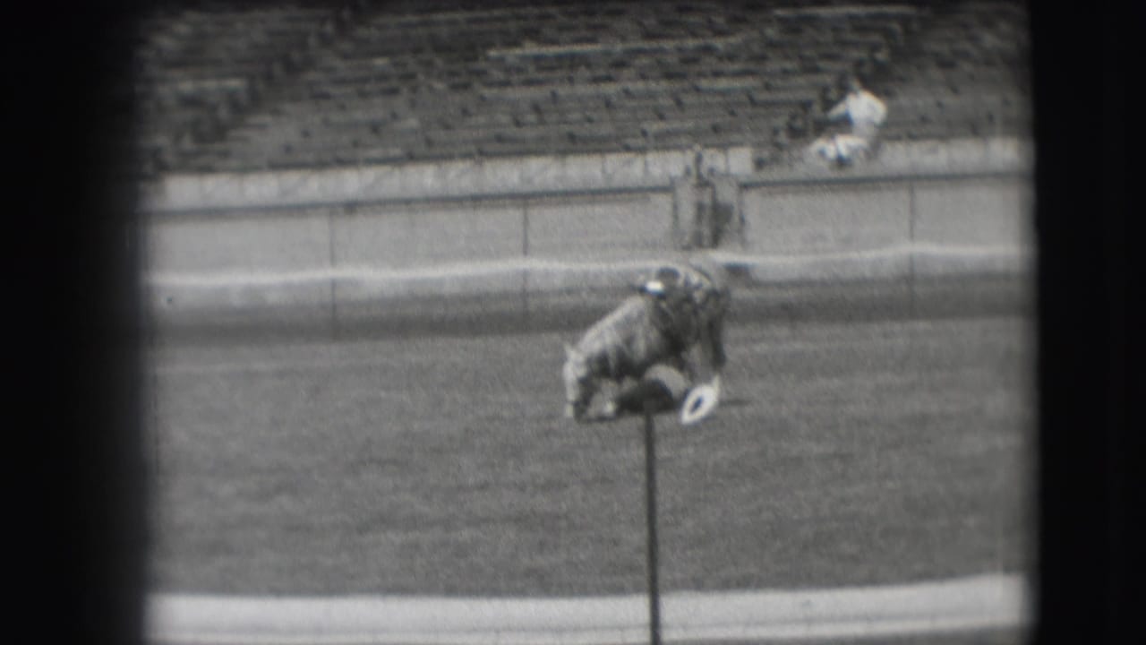 The final frame shows the horse low to the grass beside a small post, with Denver horse-show spectators and bleachers in the background.
