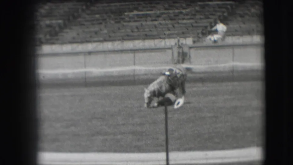 The final frame shows the horse low to the grass beside a small post, with Denver horse-show spectators and bleachers in the background.