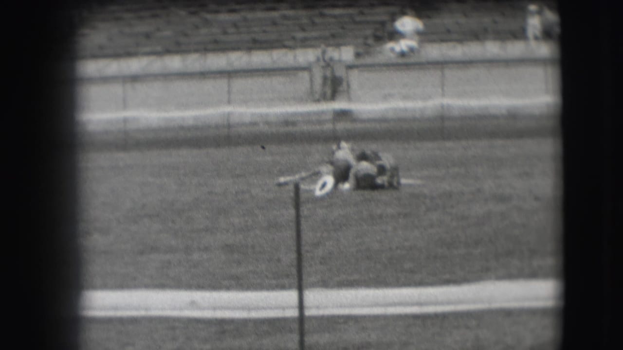 The final frame shows the horse still down on the 1941 Denver arena field near the pole, with a few spectators visible in the distant seating.