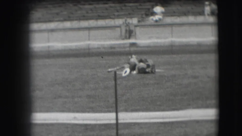 The final frame shows the horse still down on the 1941 Denver arena field near the pole, with a few spectators visible in the distant seating.