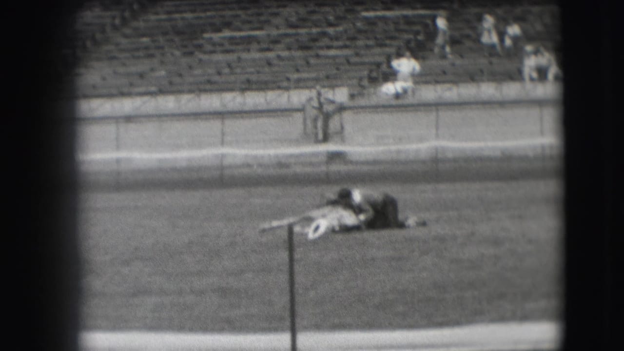 1941 Denver 8mm frame showing the cowboy sitting upright beside the horse during an arena training or show act.