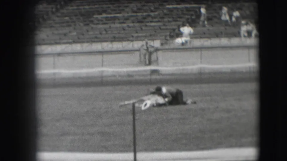 1941 Denver 8mm frame showing the cowboy sitting upright beside the horse during an arena training or show act.