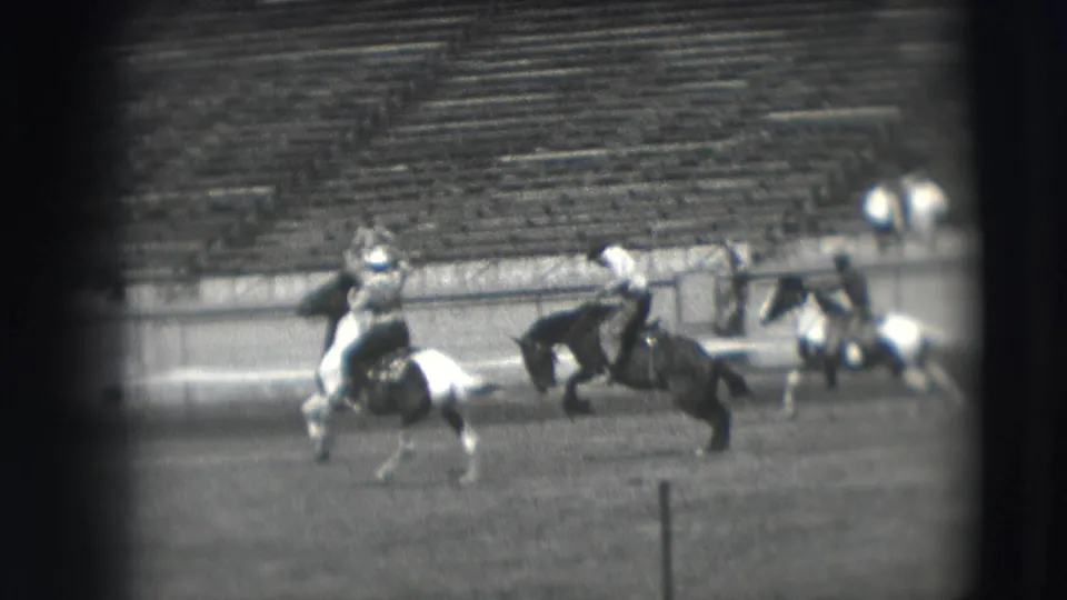 1941 Denver rodeo footage shows mounted riders in an arena, with spectators and bleachers visible in the background.