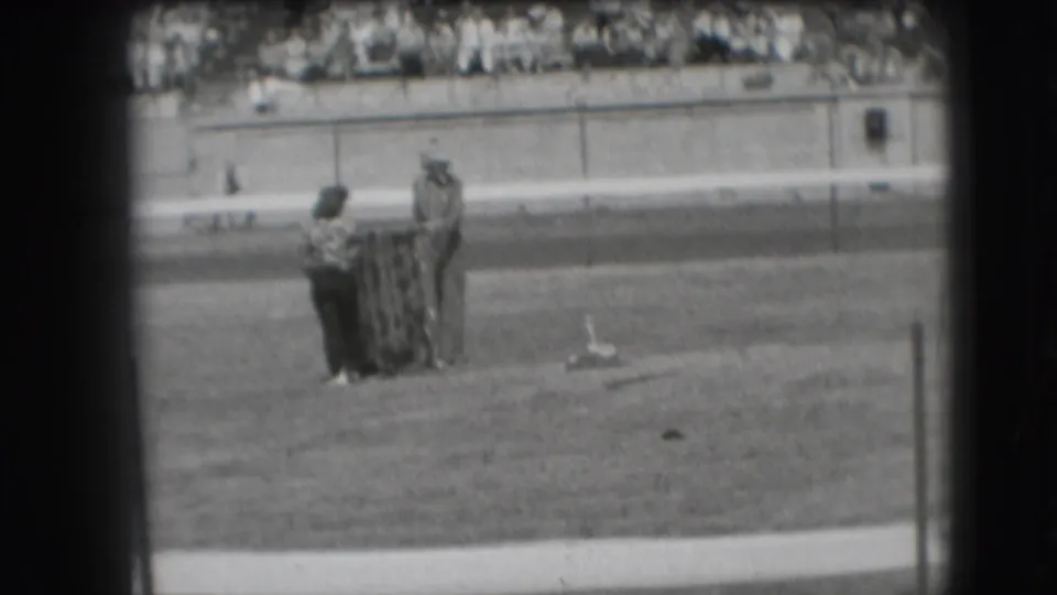 The Denver horseshoes scene shows two players beside the pit, viewed through a partly obscured 8mm frame with spectators in the stands.